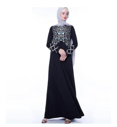 An everyday minority of ladies embroiders ABU Dhabi robes