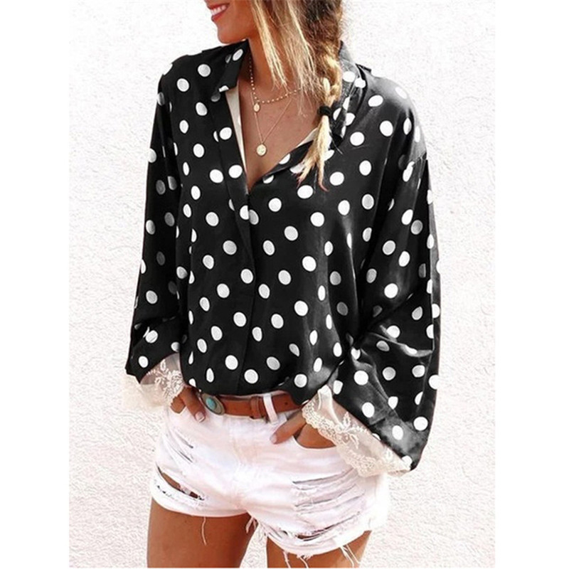 African lady's shirt with polka dot lace