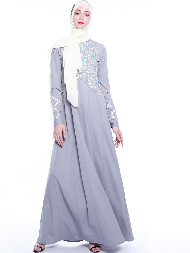 An everyday minority of ladies embroiders ABU Dhabi robes