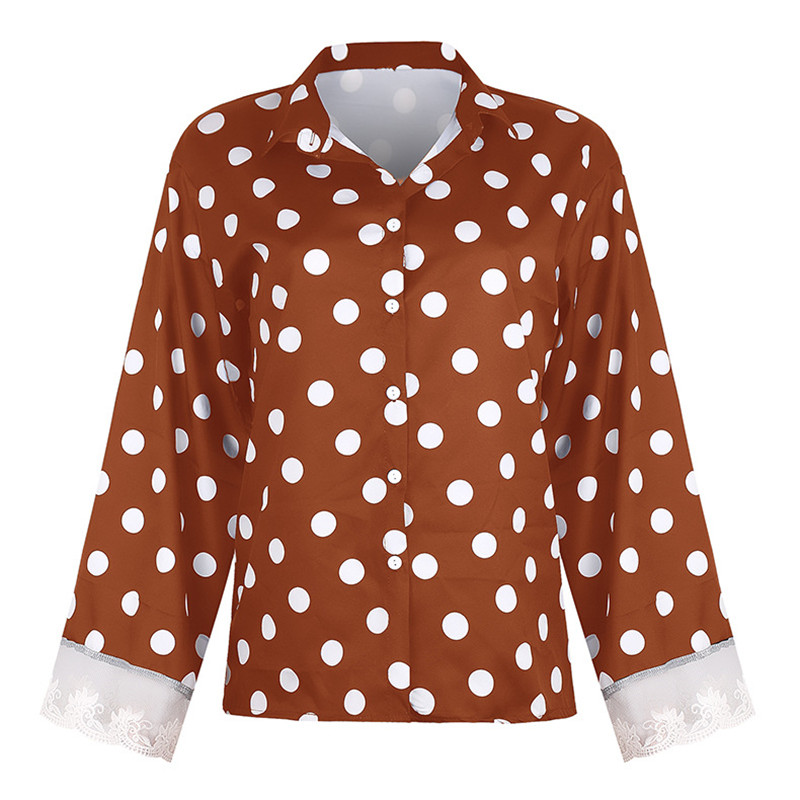 African lady's shirt with polka dot lace