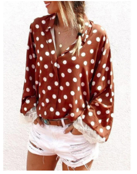 African lady's shirt with polka dot lace