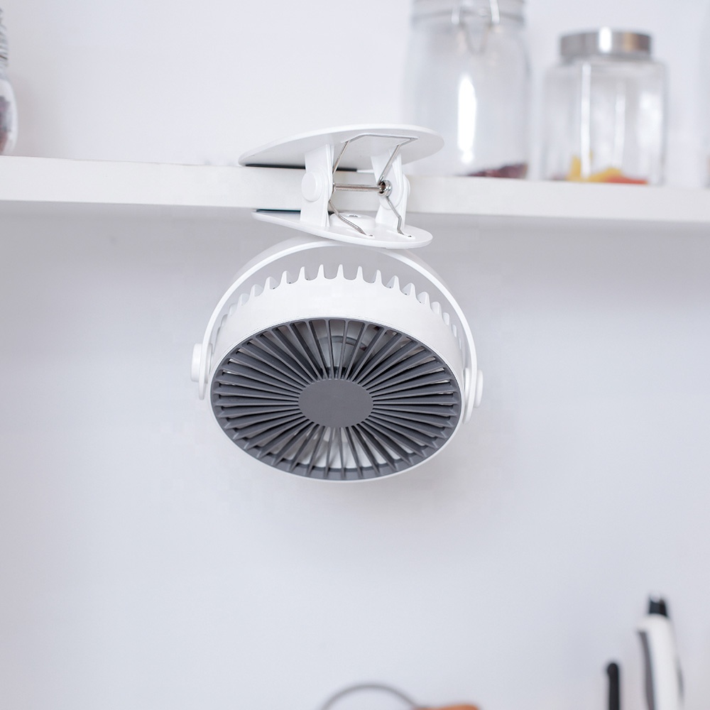 Portable battery-powered rotating electric fan