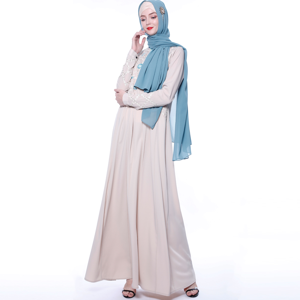 An everyday minority of ladies embroiders ABU Dhabi robes