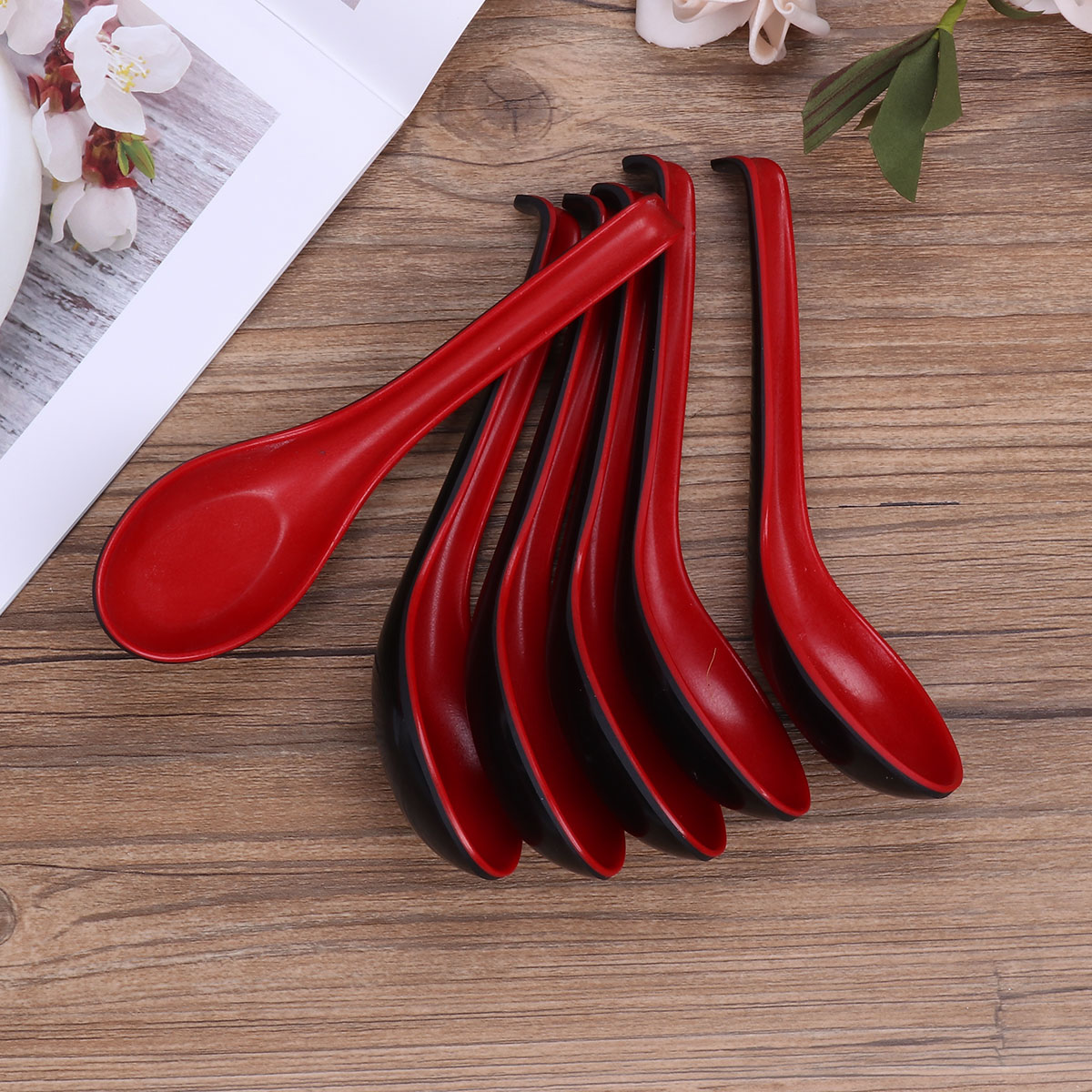 6 piece set of red and black plastic Southeast Asian spoon