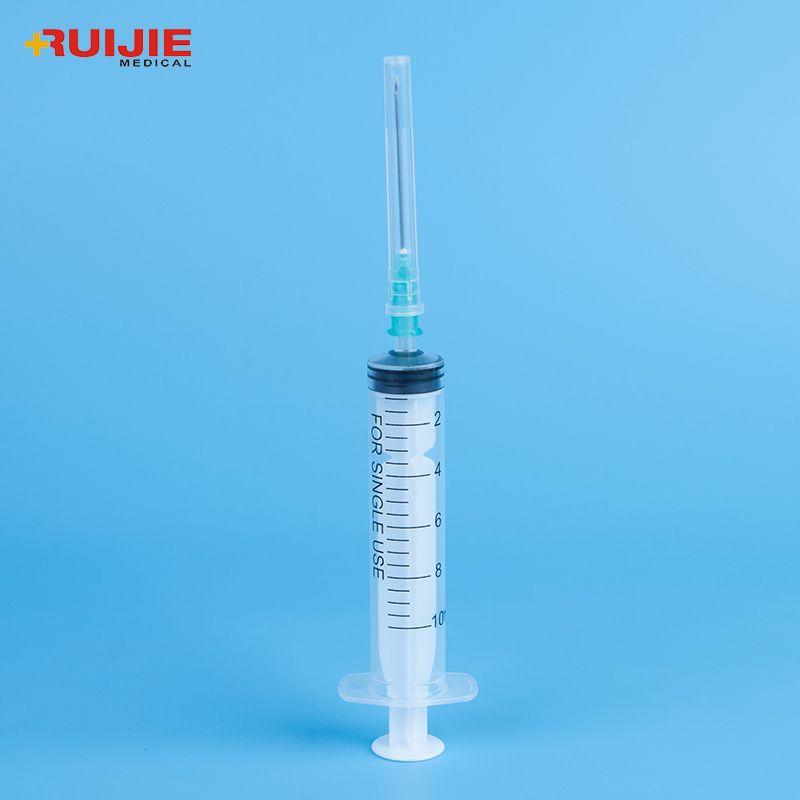 Disposable medical plastic luer lock syringe with needle