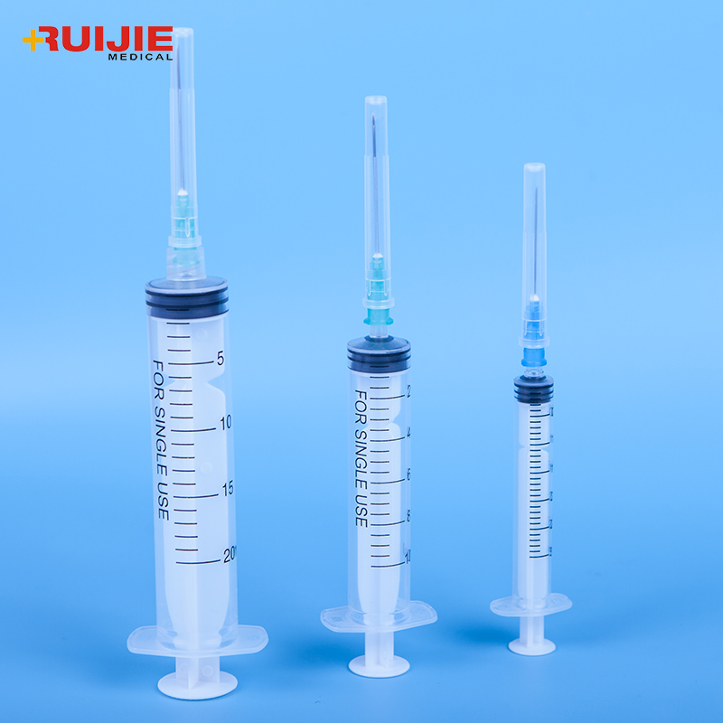 Disposable medical plastic luer lock syringe with needle