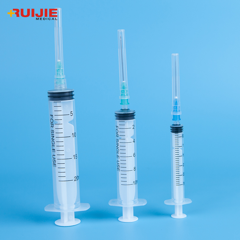 Disposable medical plastic luer lock syringe with needle