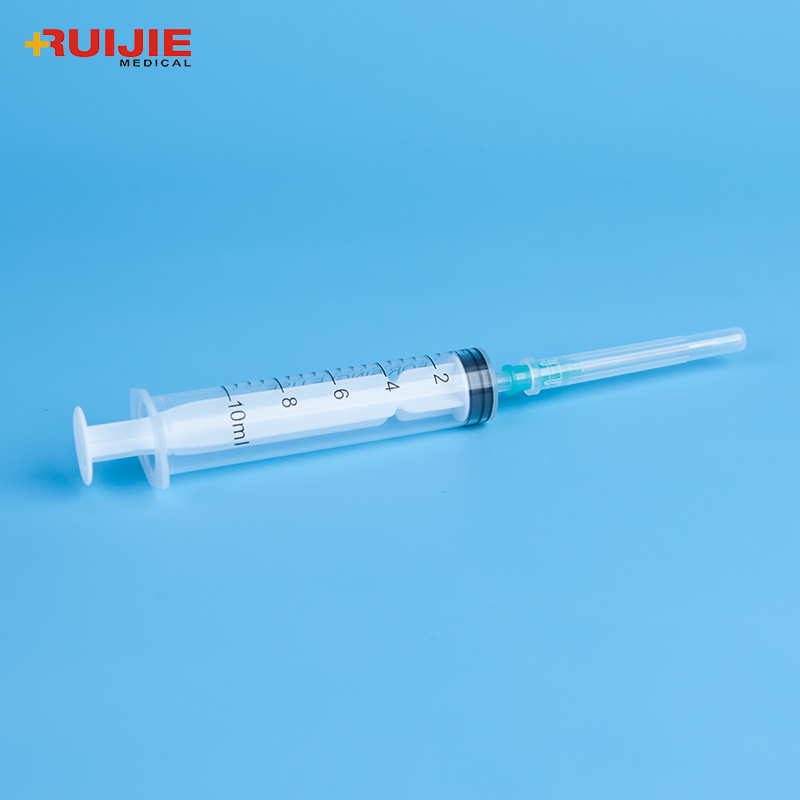 Disposable medical plastic luer lock syringe with needle